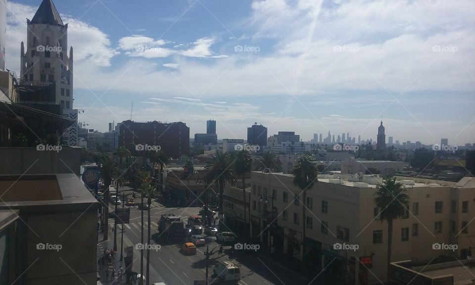 overlooking Hollywood Boulevard facing ESE from Dolby Theatre Complex. Downtown Los Angeles is visible.