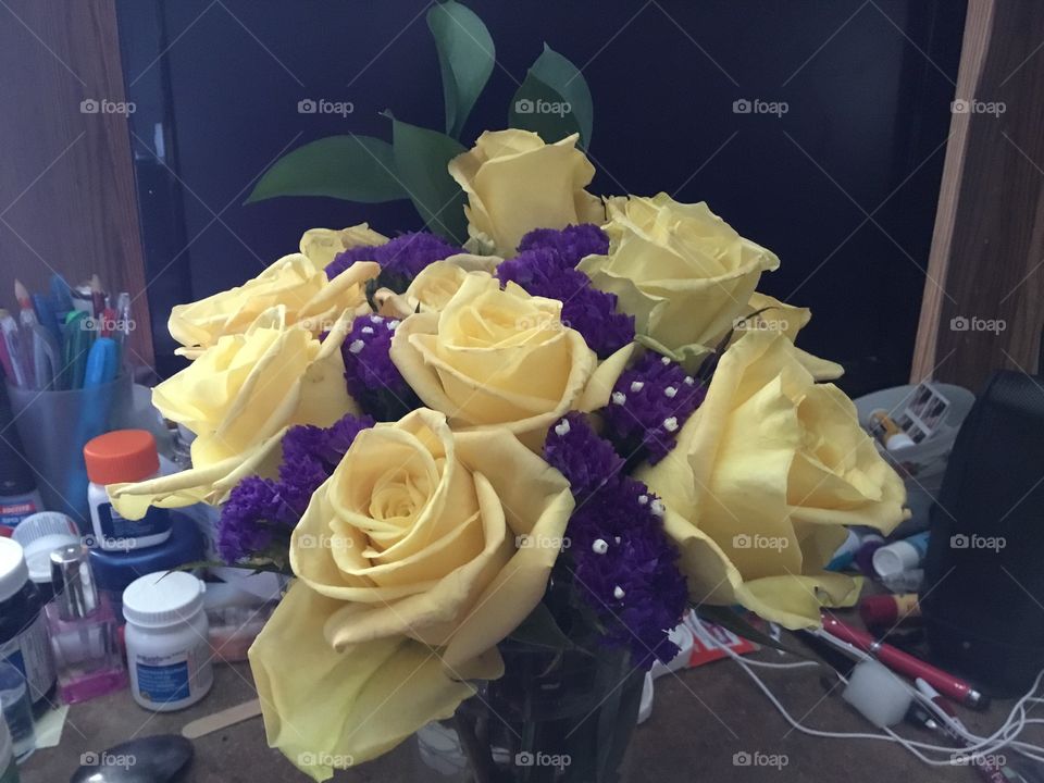 Yellow roses and purple posies 