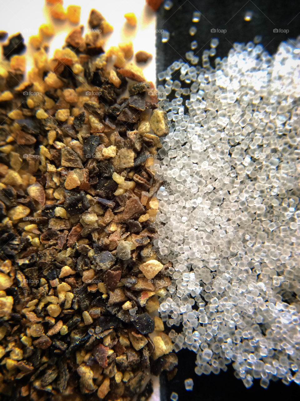 Always a must in the kitchen and so beautiful in a close up shot...salt and pepper (or pepper and salt in this case). This picture was captured through the 15x macro lens of an Olloclip attached to the camera on an iPad Mini. A tripod was used for stability and clarity during the photo shoot.
I used a blank white paper and black marker to give the shot a bit more contrast in the background too. No flashes were used, just the ambient light of the sun through my kitchen window. Bon Appetite.