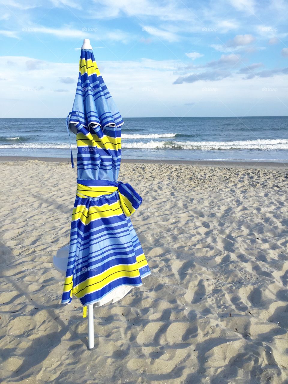 Umbrella. Colorful beach umbrella stand alone in Myrtle Beach South Carolina