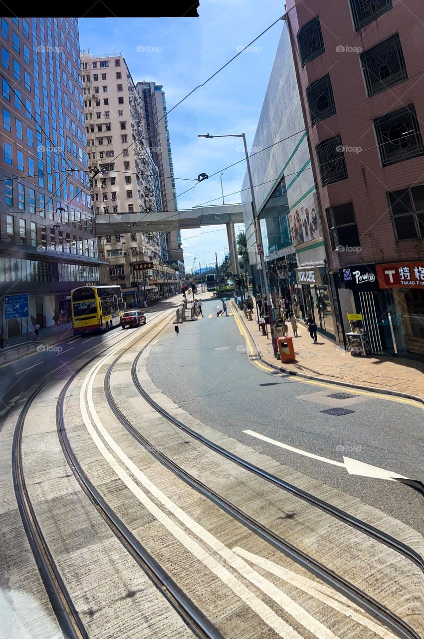 train line in the middle of Hong Kong city