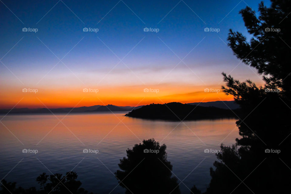 Scenic view of sea at sunset