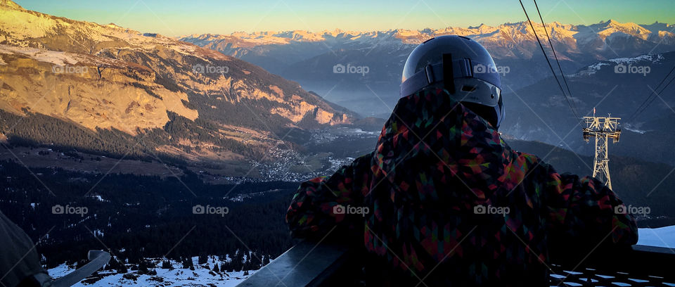 Skier looking out over the Swiss alps