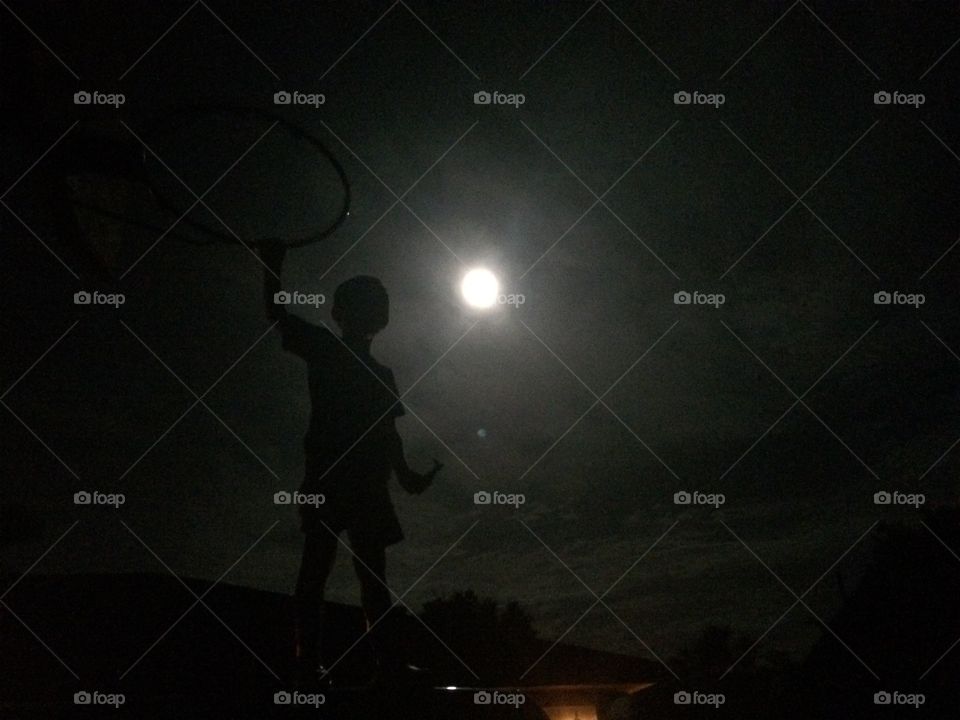 Boy Standing in the moonlight 