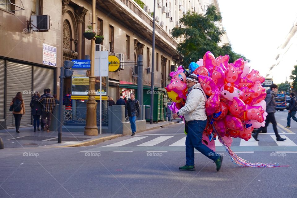 Man taking balloons