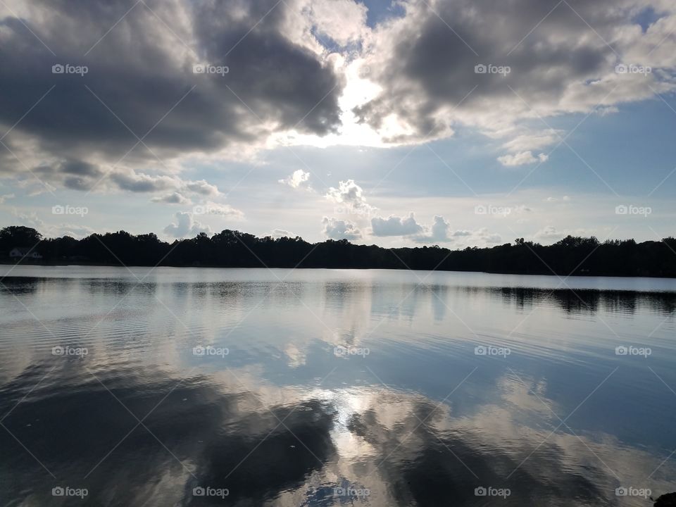 Ultimate reflections on the water. perhaps the gateway to another realm is opening just behind the surface