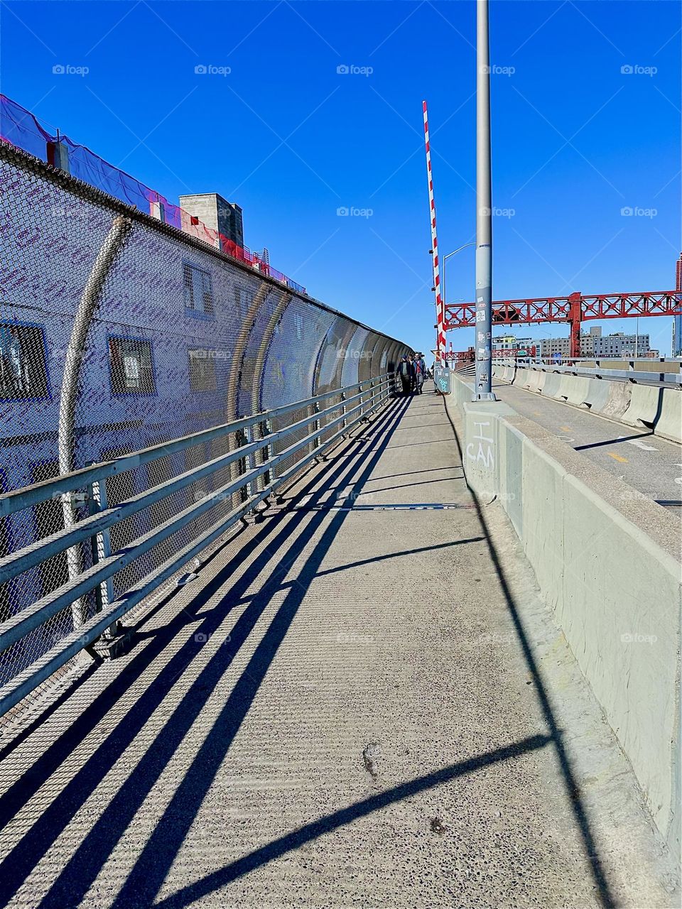 These are the pedestrian and bicycle lanes of the “Pulaski Bridge” at “Newtown Creek” that connects “Greenpoint”, Brooklyn to LIC, Queens which is the direction that we are currently facing. 2024. Hypnotic Productions