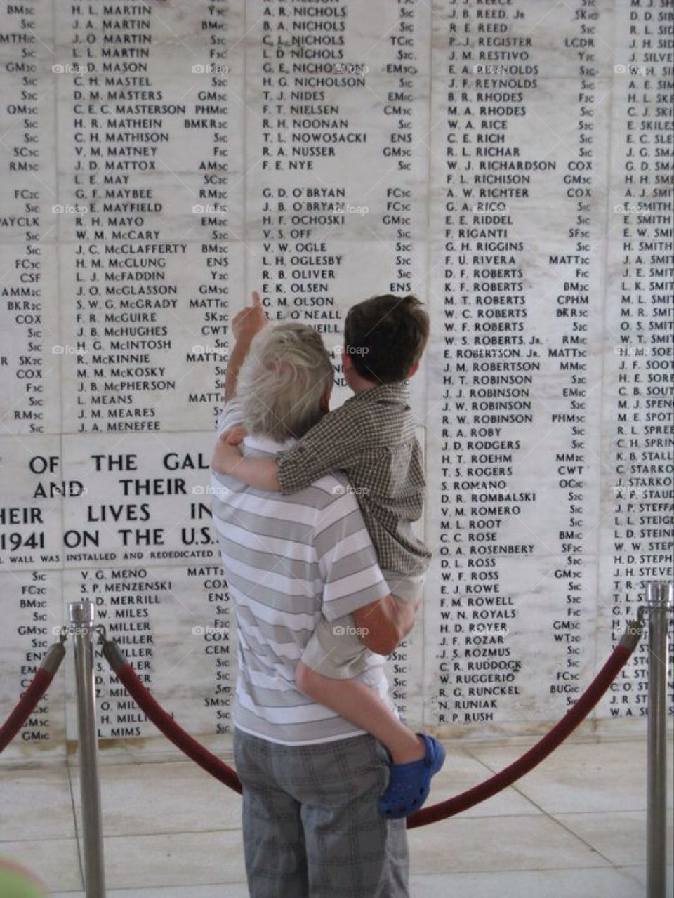 Reading the names of those who died on December 7, 1941