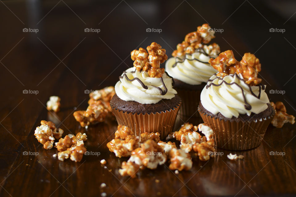 Chocolate cupcakes with popcorn garnish