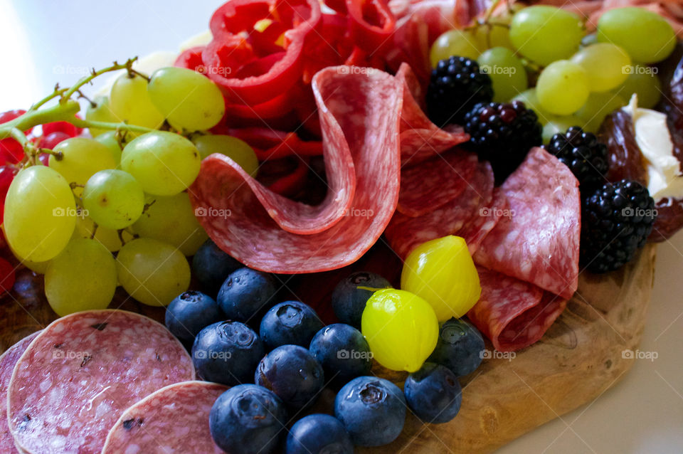 Fruits and meats on the plate 
