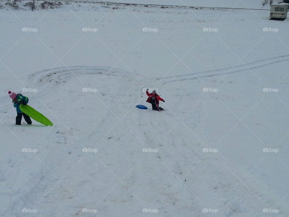 sledding in the front field