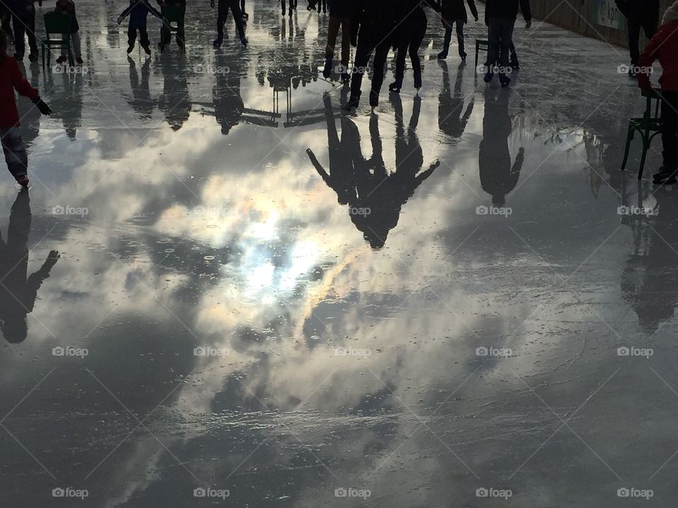 Reflection of ice skaters in Amsterdam