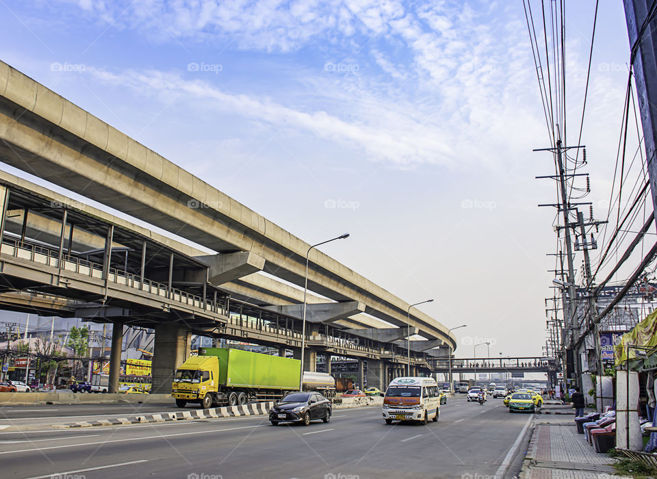 Many cars on the road and sky rails  at Kanchanaphisek Road, central west gate , Nonthaburi  in Thailand.  January 7, 2019