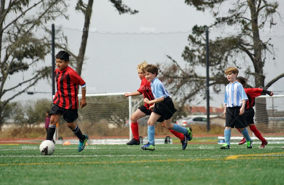 Young Boys Playing Soccer