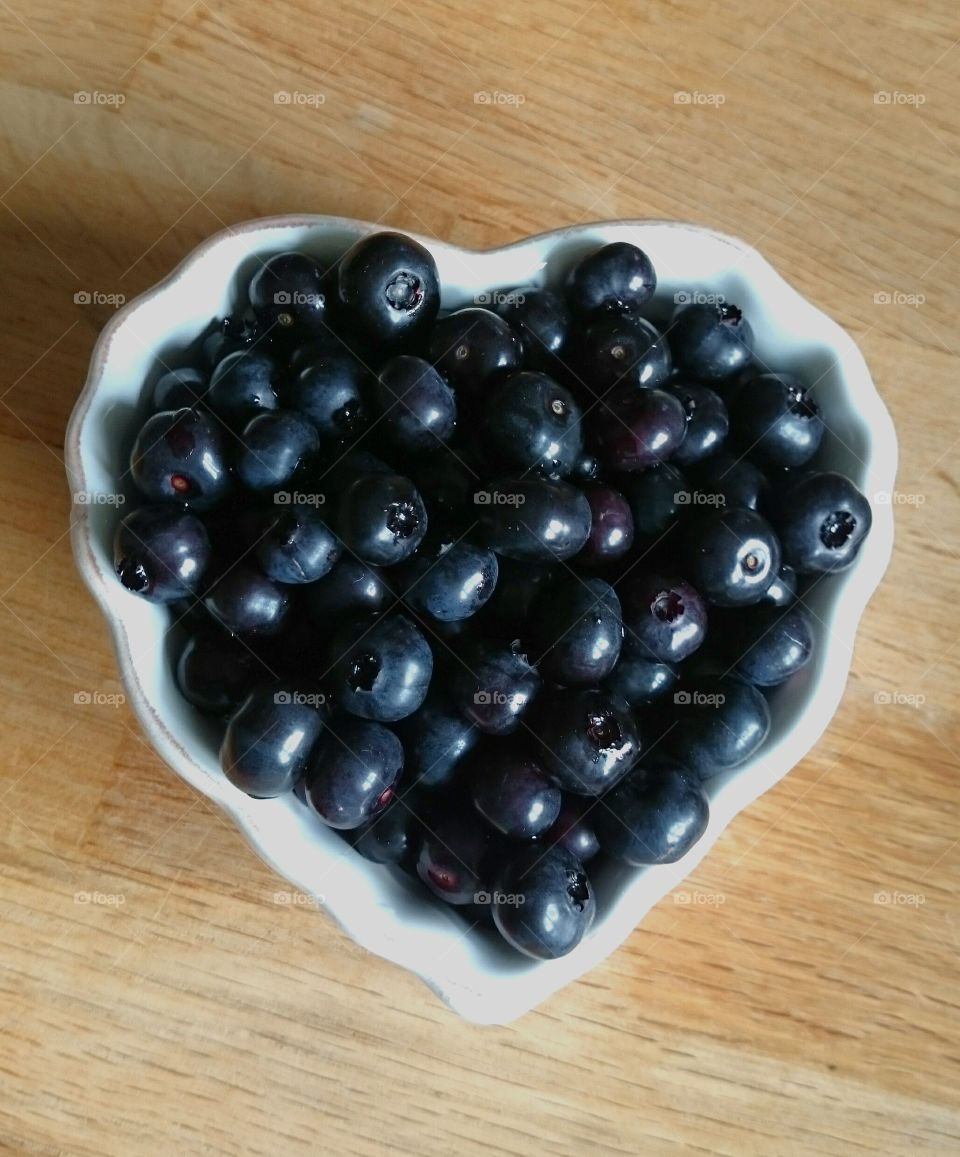 Blueberries in a heart bowl