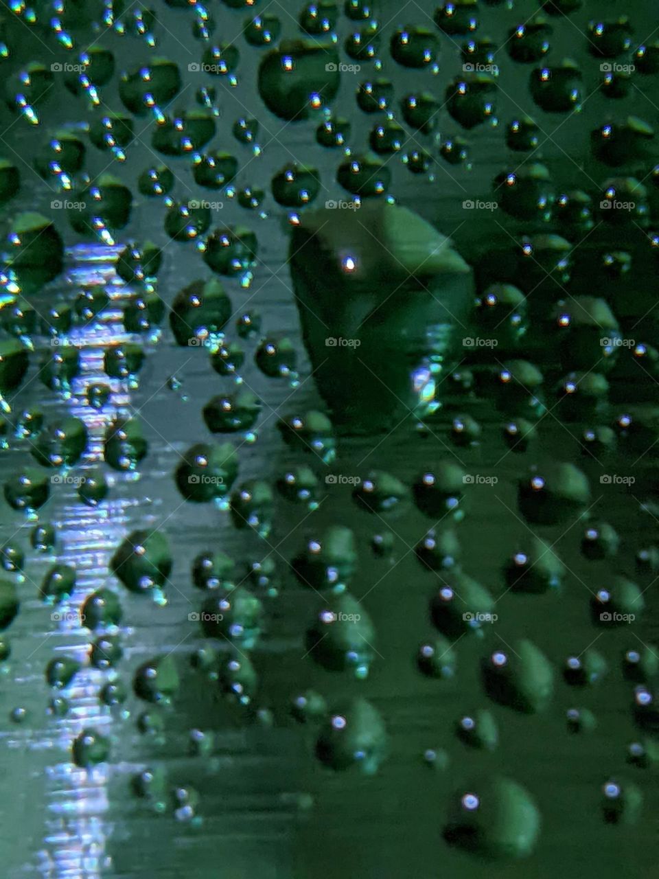 dew from a cold drink bottle