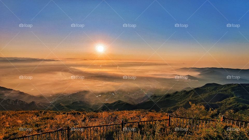 Camping outside and watching the sunrise,