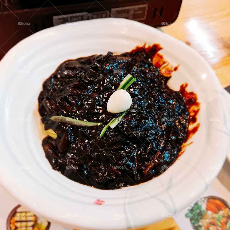 Jajangmyeon is a Korean Chinese noodle dish topped with a thick sauce made of chunjang, diced pork and vegetables