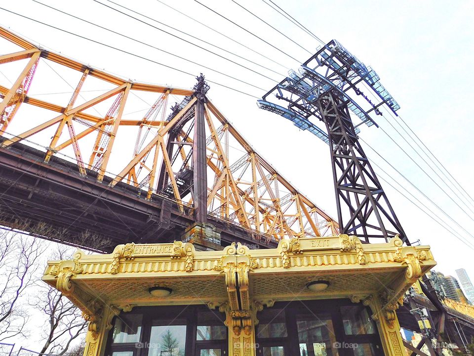 Looking up at the Roosevelt Island Tramway and the Ed Koch Queensboro Bridge from the old victorian tramway station