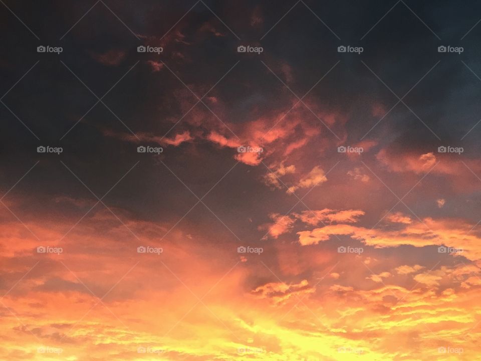 Low angle view of dramatic sky at sunset