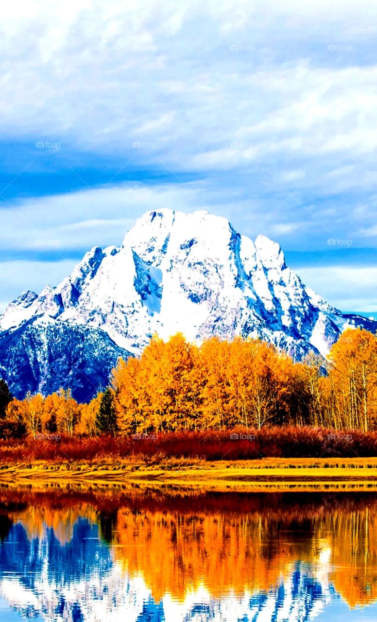 So natural place mountain and muster colours tree looks so pretty and so nice blue water river lovely nature place looks amazing