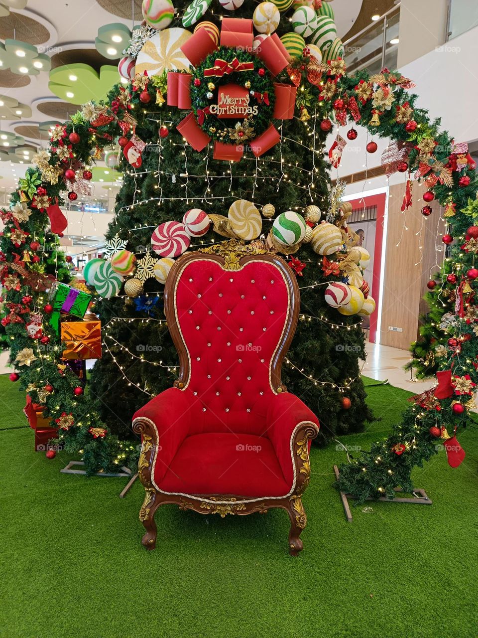 "A throne awaits beneath the sparkling tree, where holiday magic meets a seat fit for Santa."