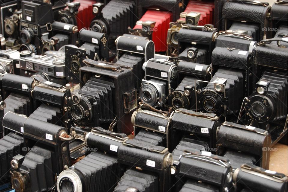 Different beautiful camera lenses in a row.