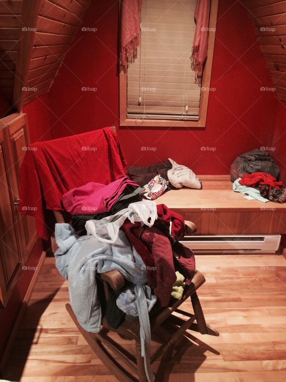 Who needs a closet when you have a perfectly good rocking chair?