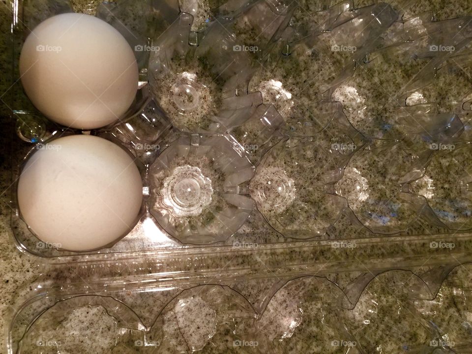Two eggs in container
