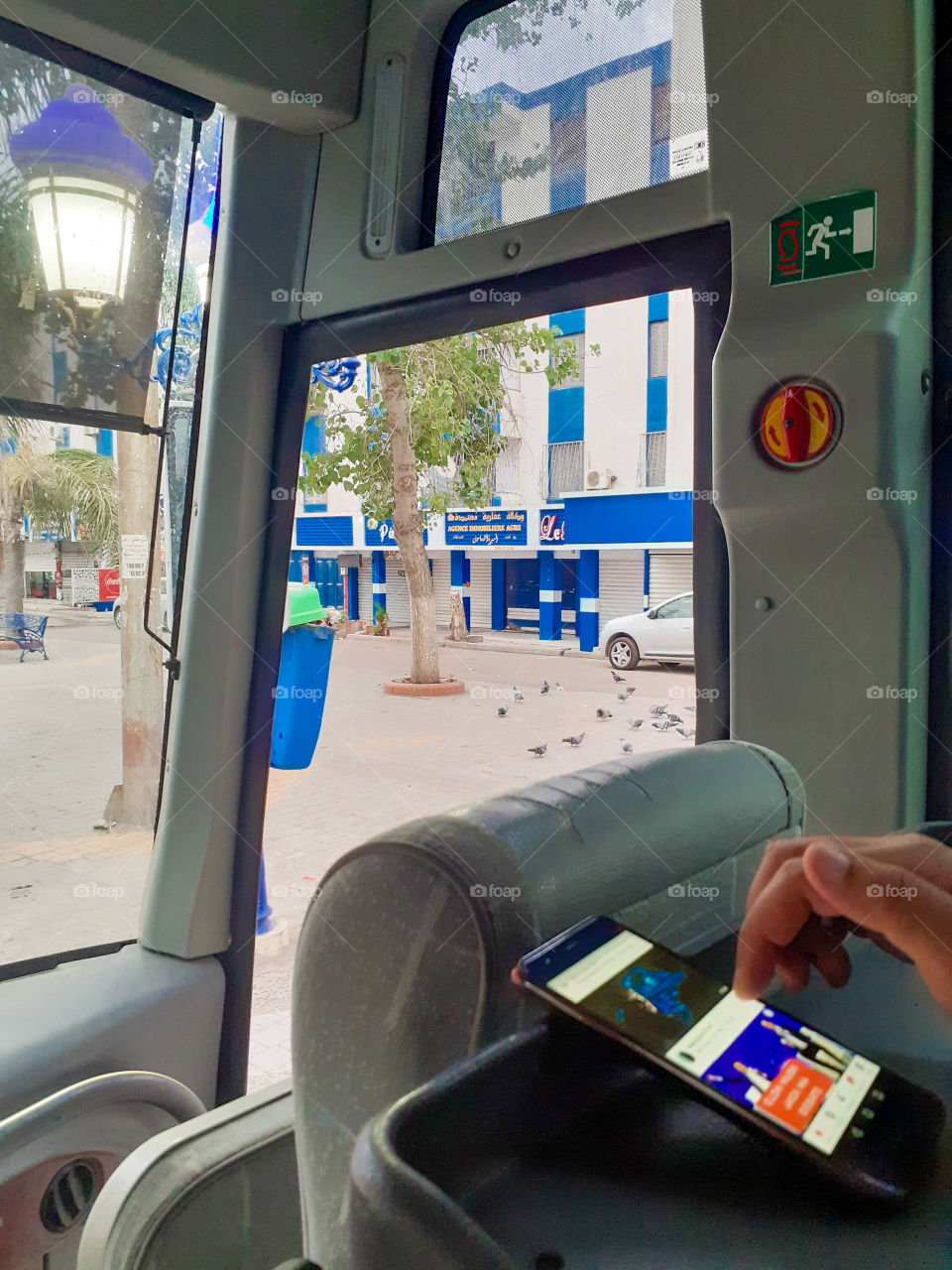 cell phone during travel in the bus