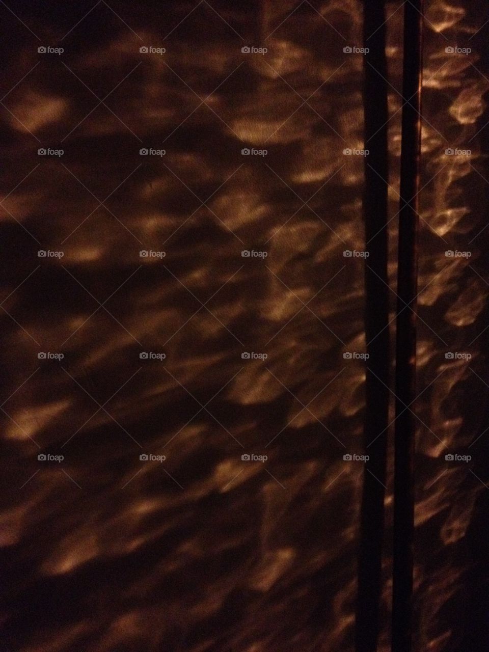 streetlight pattern through window