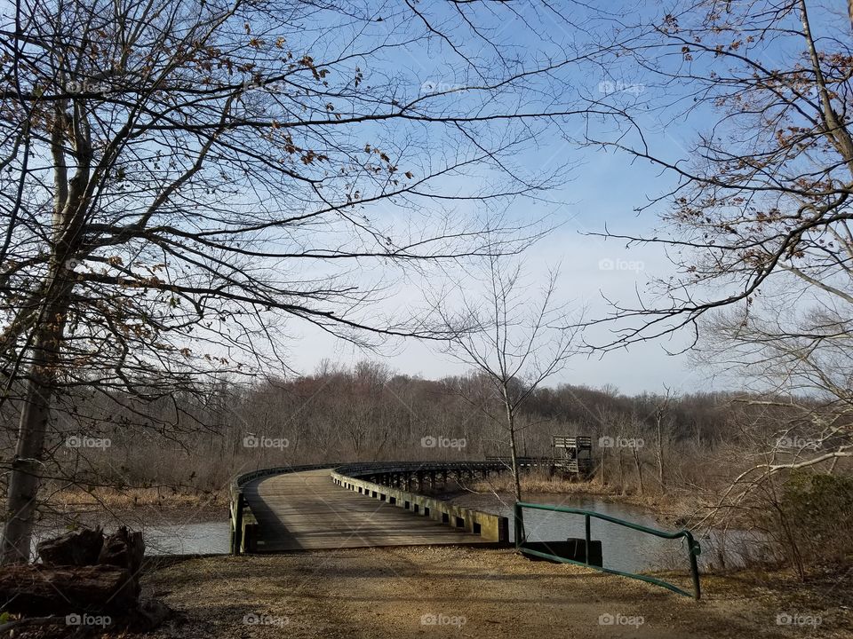 an old wooden bridge in a park in Maryland, United States