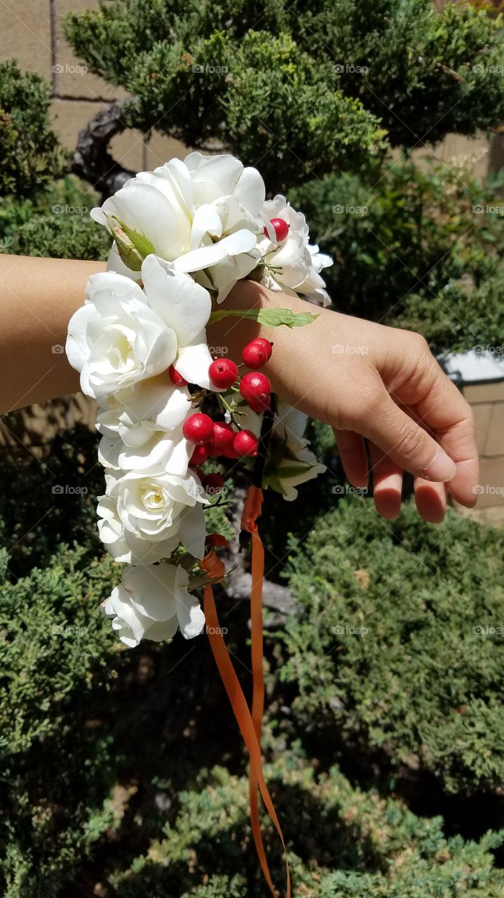 Holding flower crown