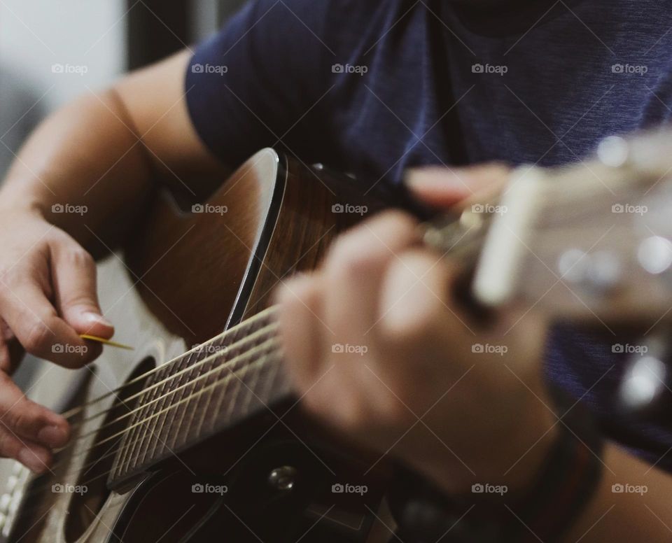 Playing guitar