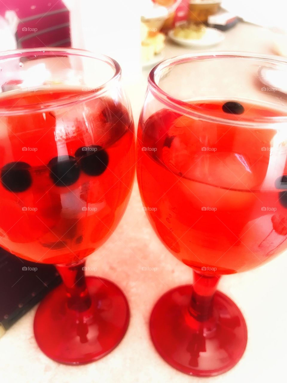 two glasses of red aperitif close up