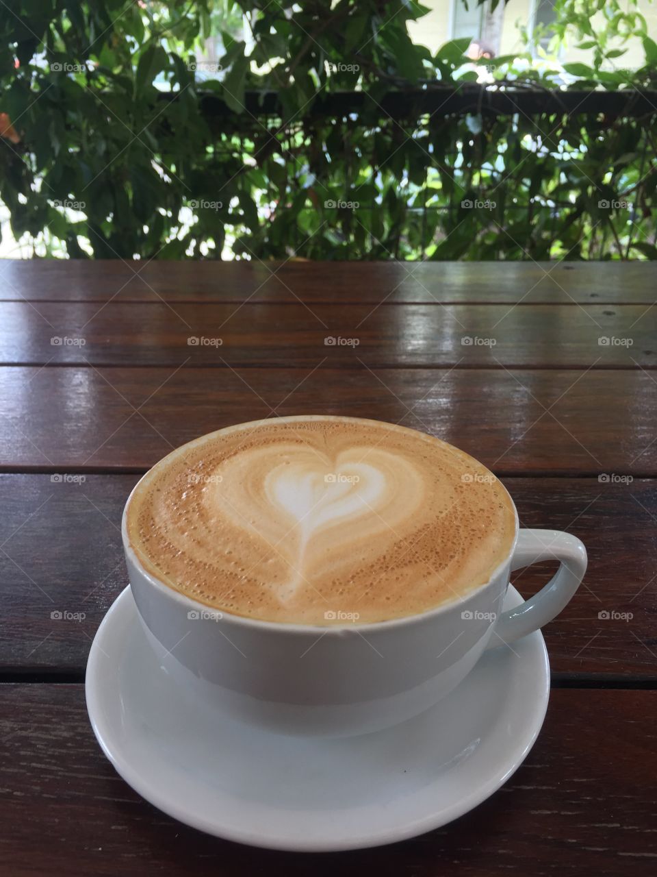 Cappuccino in garden patio