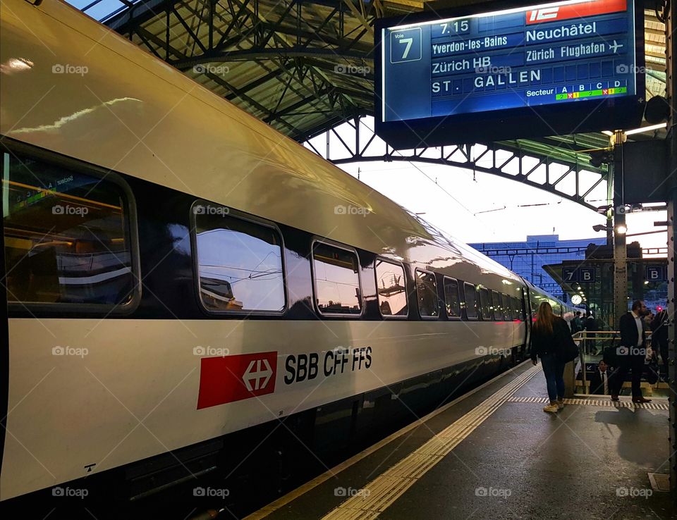 travelling by train.  train In station. Lausanne