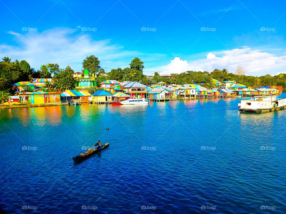 Beautiful view of the Rainbow Village in Tual City with itu blue bay