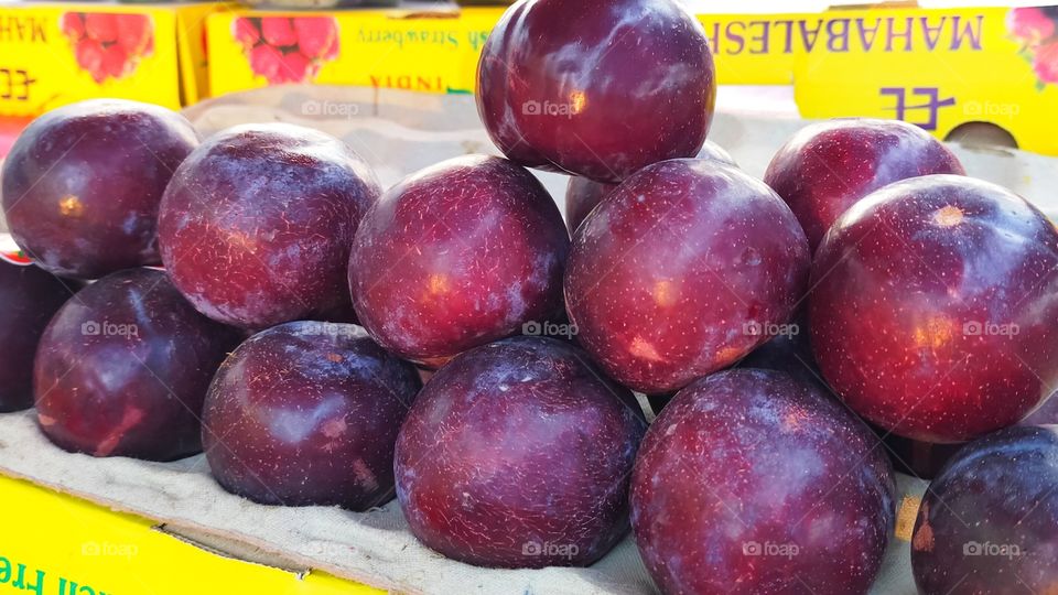 European Plums or Garden Plums are kept ready to sell in local market.