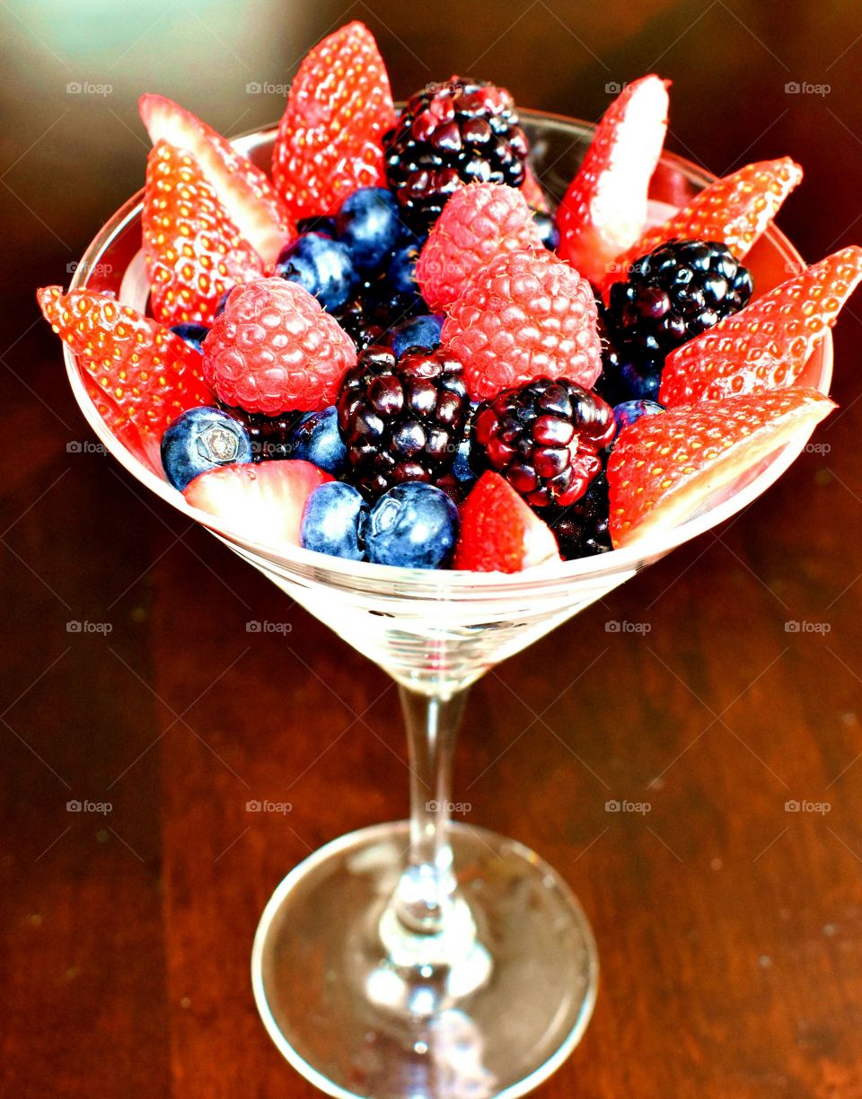 blueberries raspberries strawberries blackberries fruit martini glass
