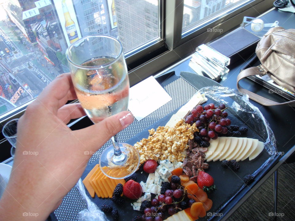 Toast to NYC. Champagne toast in Manhattan hotel 