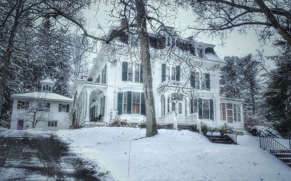 Large New England Home in The Winter Snowy Season 