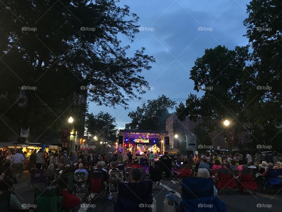 People enjoying live band outdoors