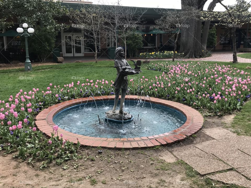 Lady in the fountain garden