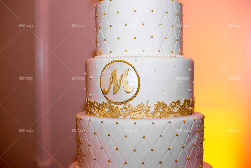 Six tier monogramed wedding cake close up