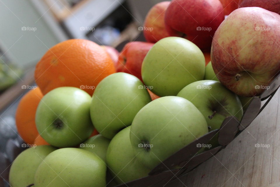 A nice array of fruit. It has a blurred background and is very high def.