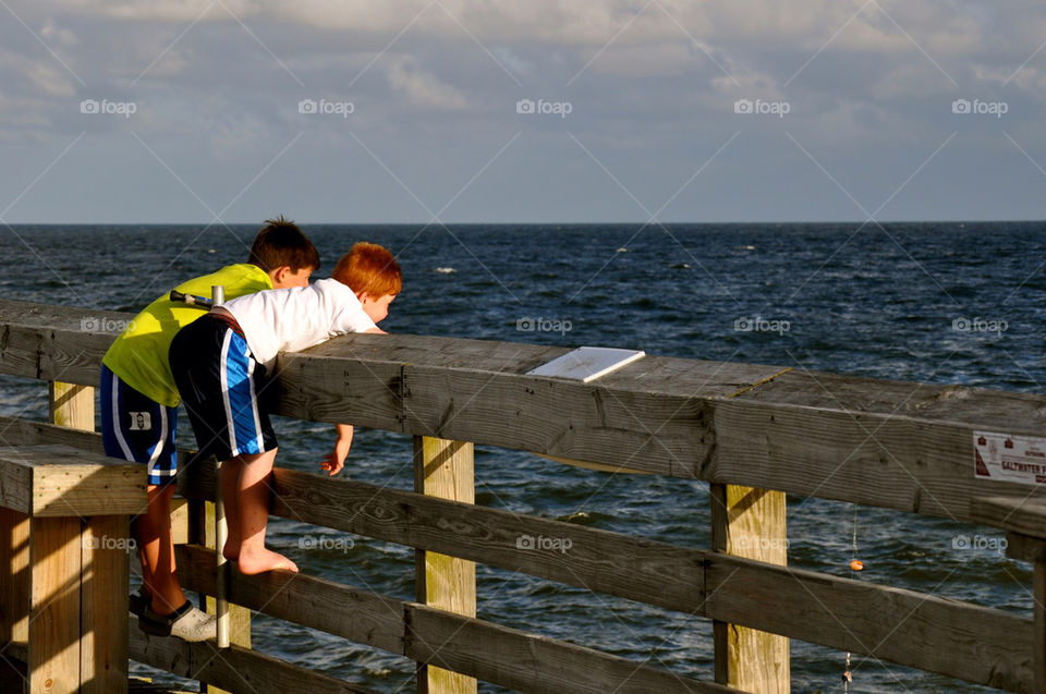 Boys on pier