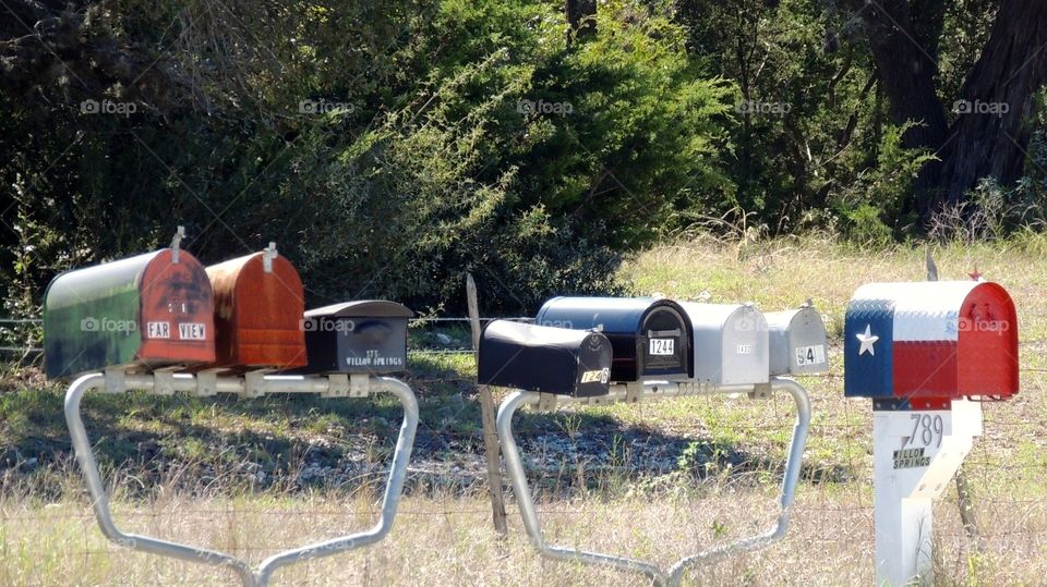 Got mail?. Mailboxes in a tow on a country road in Texas