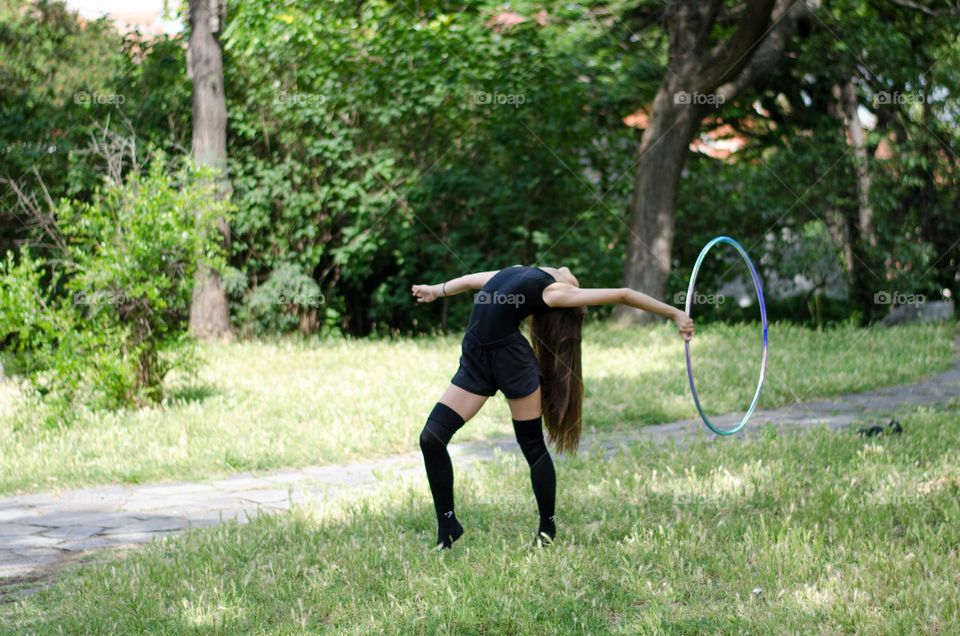 Beautiful Young Gimnast Dancing in Nature