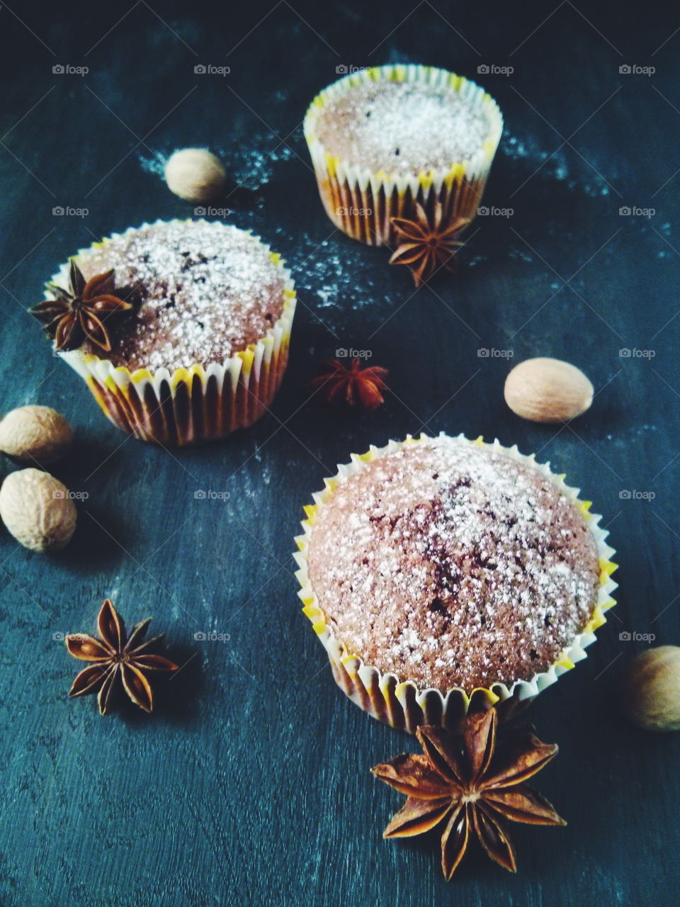 Muffins. Several chocolate muffins on dark background